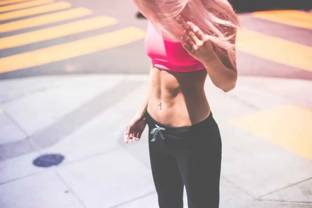 Woman with toned stomach after LA-EMS Body Sculpting Treatment Wheathampstead